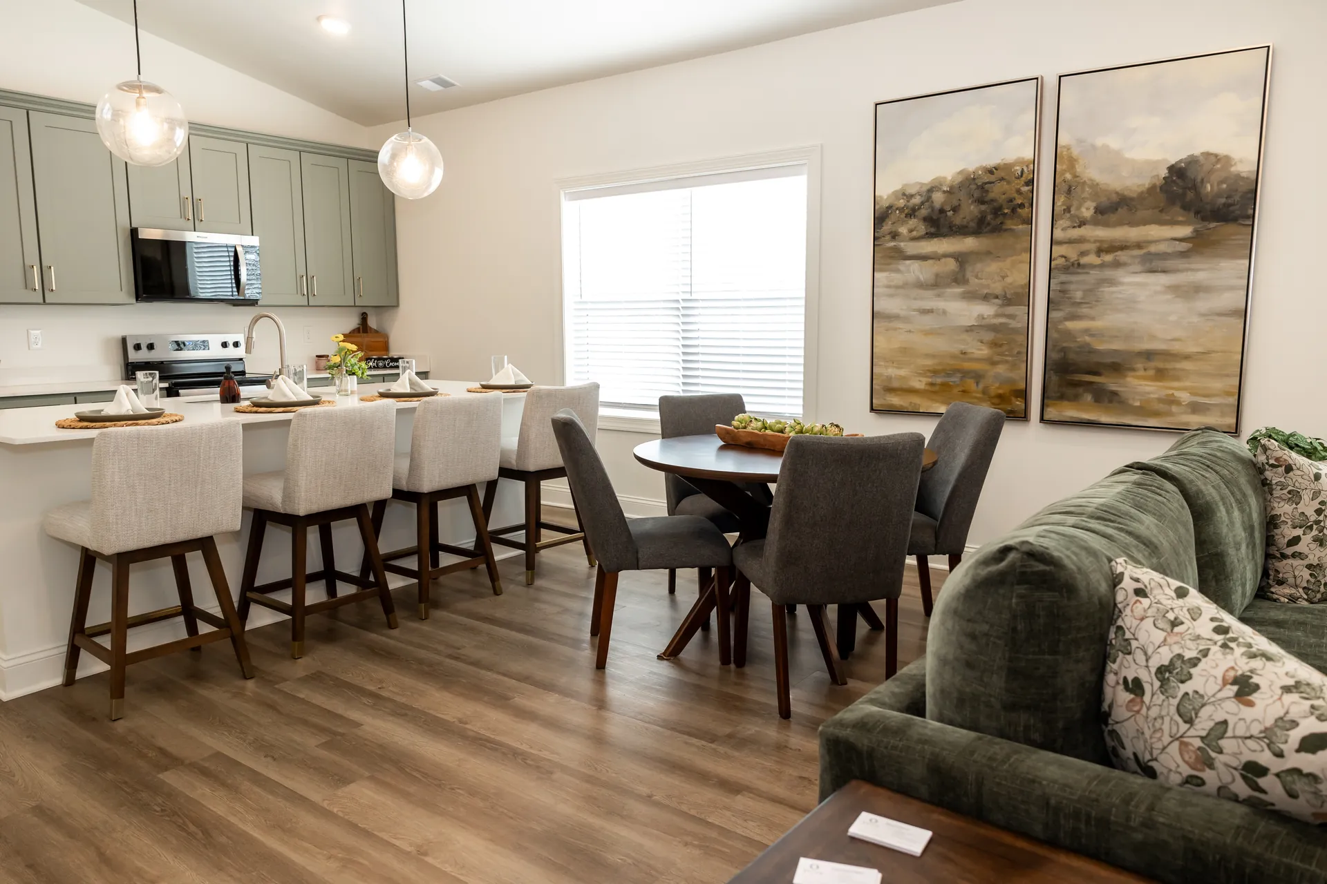 Open-concept kitchen and dining area at The Cottages